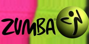 Zumba logo on a hot pink and lime green background.