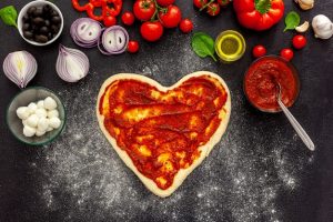 heart-shaped-pizza-tasty-love-concept-valentine-s-day-design_279682-2212