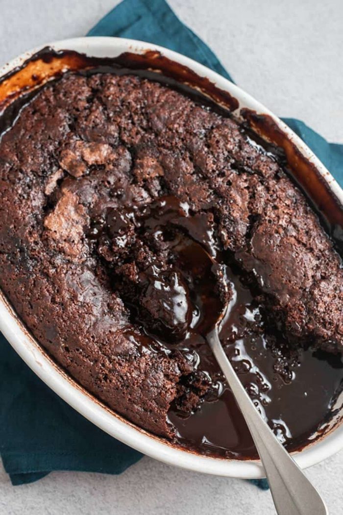 The view from above of a chocolate cake with a liquid fudge center.