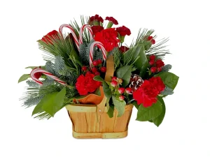 Holiday flower arrangements of red carnations, candy canes, pine cones, and greenery in a basket.