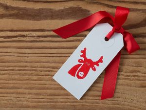 Christmas, gift tag, printed, red ribbon, background wood